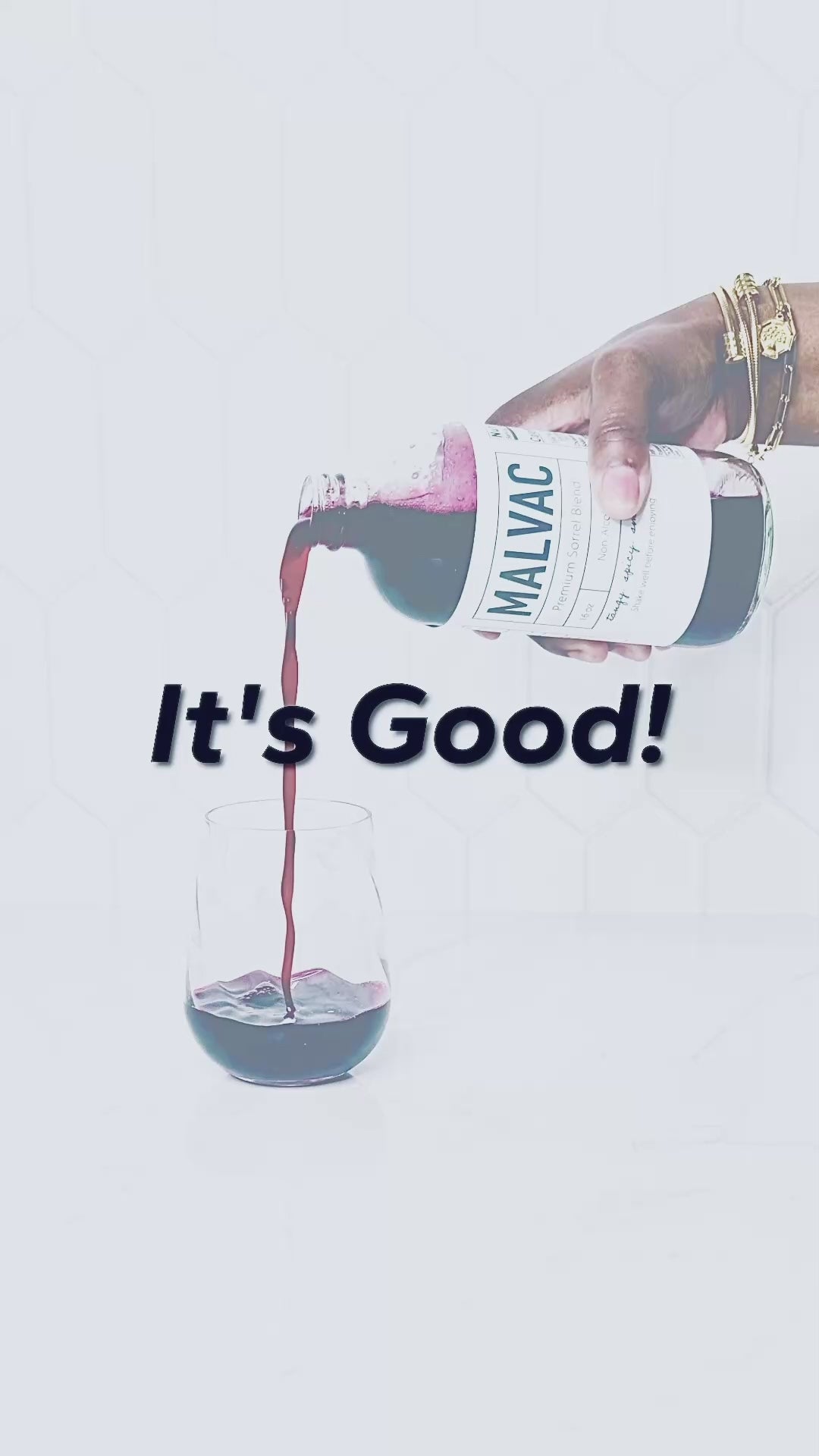 It's good. Two women give verbal opinion about the taste of MALVAC Premium Sorrel Brew at an outdoor fair. Music playing in background. 