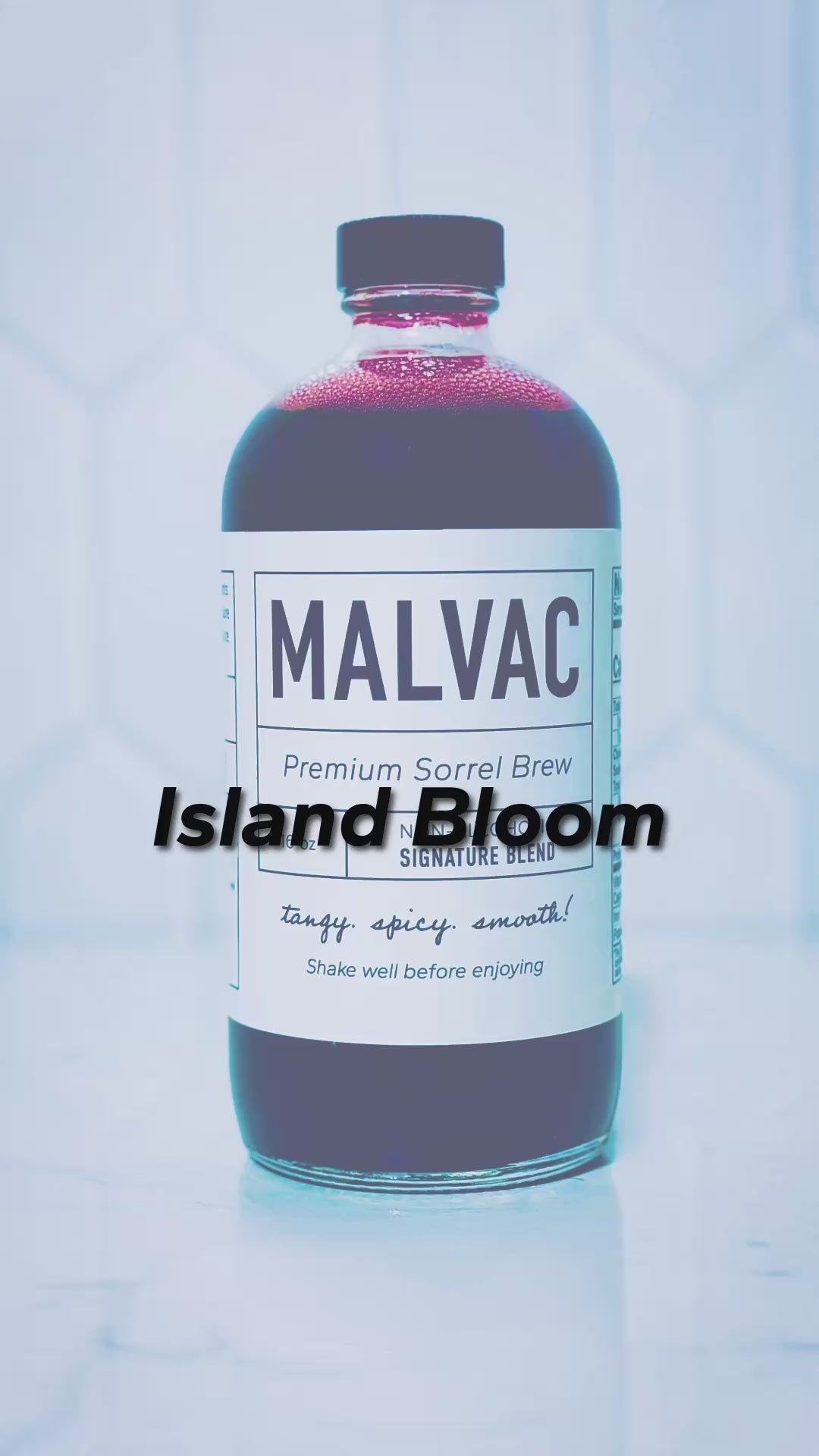 A MALVAC Premium Sorrel mocktail made with MALVAC, pineapple juice, ginger ale, frozen MALVAC balls, and garnished with fresh dragonfruit. The setting is outdoors and the mocktail is mixed on a marble tray with a fresh pineapple nearby. Afro beats music playing in the background. No vocals.