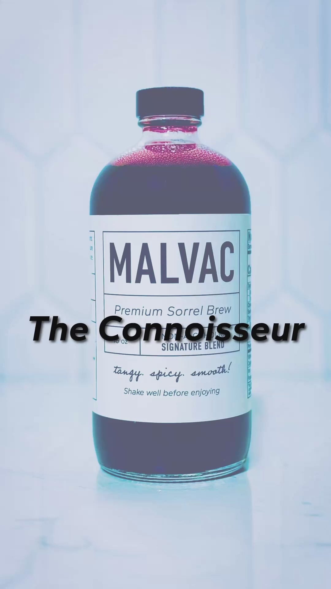 The Connoisseur. Man gives verbal opinion about the taste of MALVAC Premium Sorrel Brew solo and after blending with chardonnay, at trade event. Music playing in background. 