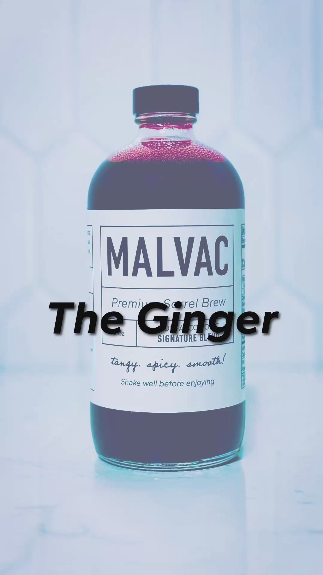 The ginger. Man gives verbal opinion about taste of MALVAC Premium Sorrel brew at trade event. Calls out the taste of ginger. Music playing in background.