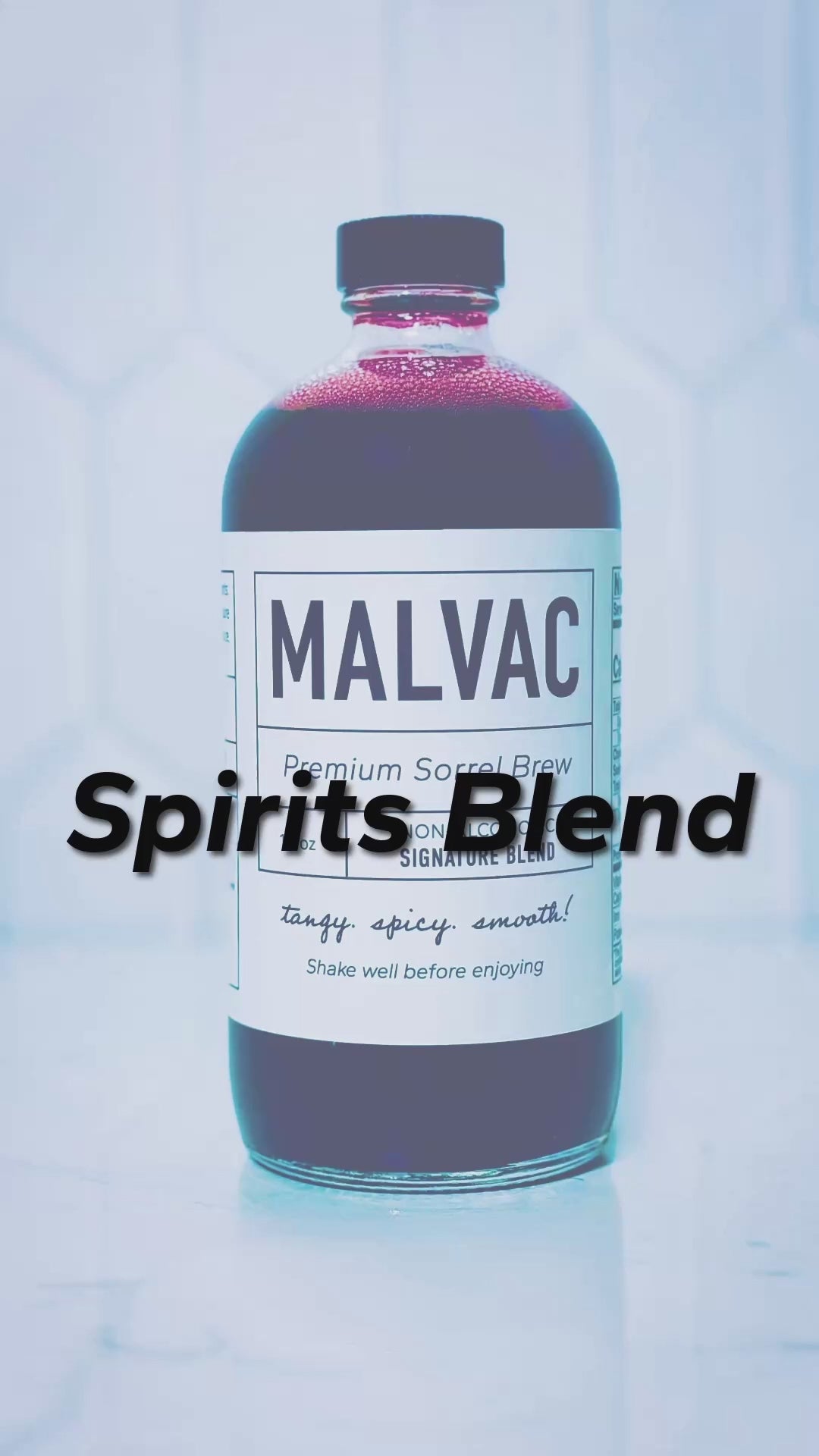 Sprits Blend. Three people talking about and demonstrating blending MALVAC Premium Sorrel Brew with other liquids to create a spirits blend. Shaking mixture in a shaker, adding ice in a glass with garnishment and pouring mixture into glass. Taste testing the mixture. 